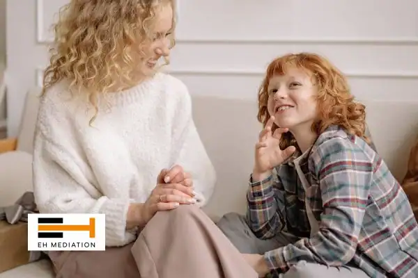 Happy mother and child after sorting child arrangements mediation Farnham